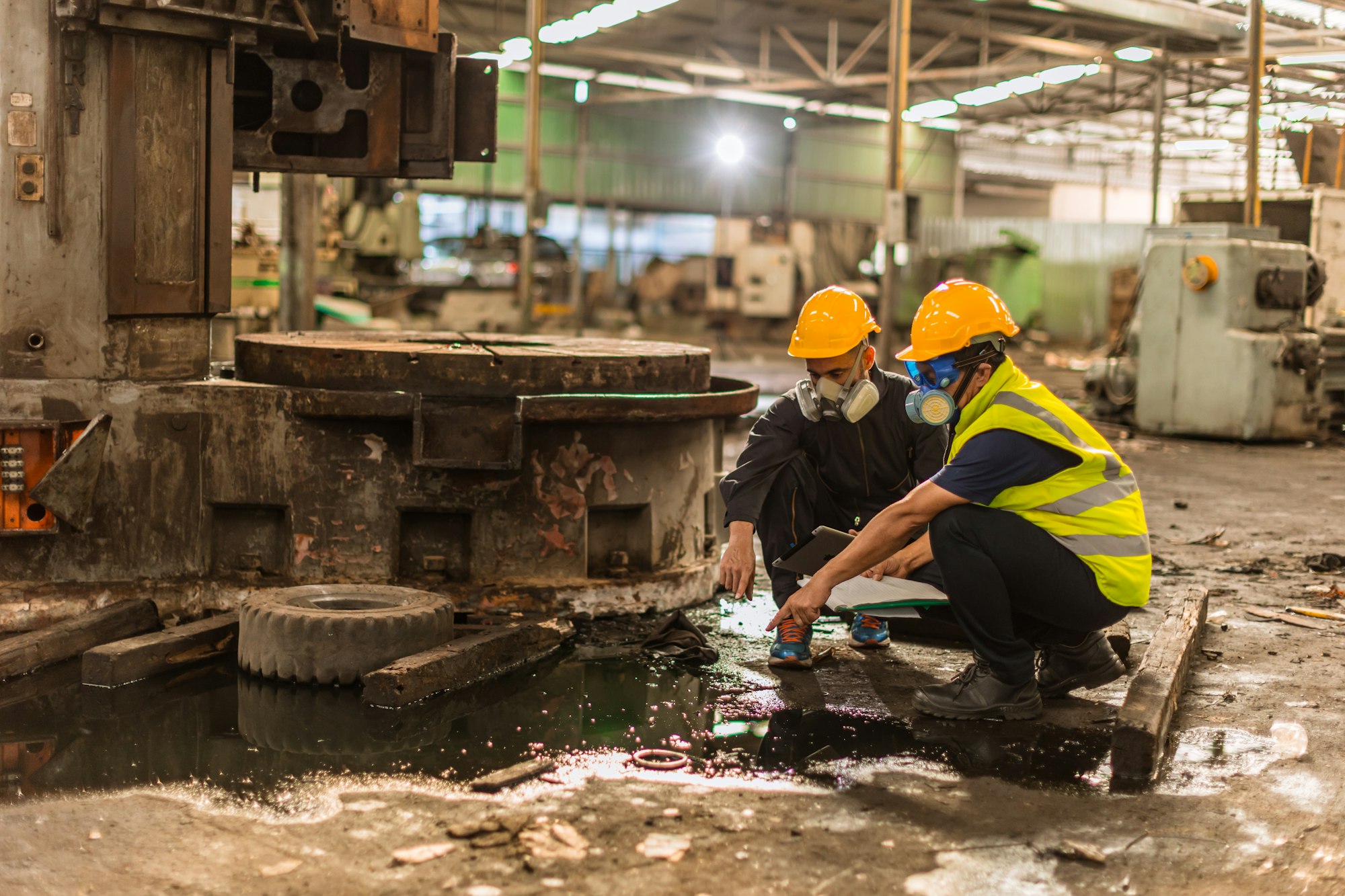 Chemical toxic liquid dirty oil leak danger to environment impacts investigation team working site r