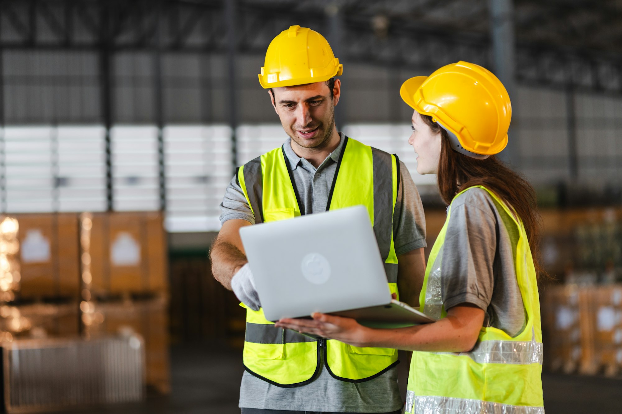 Warehouse worker logistic team working in packed goods warehouse for industry business of delivery